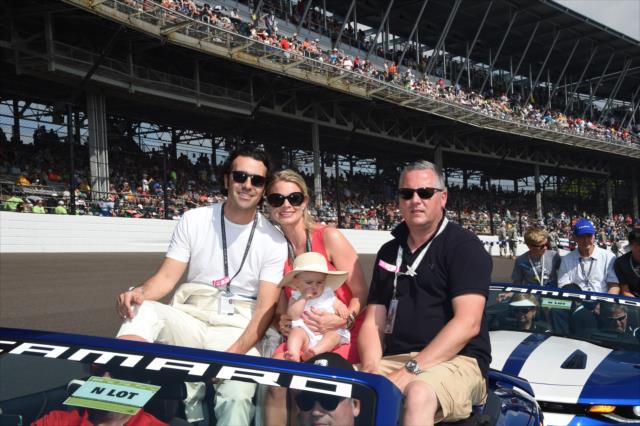 Dario Franchitti and his family ready for a parade lap during pre-race festivities for the 100th Indianapolis 500 -- Photo by: Jim Haines