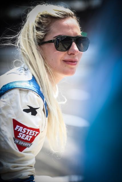 Lady Gaga is suited up for her 2-seater ride with Mario Andretti during pre-race festivities for the 100th Indianapolis 500 -- Photo by: Shawn Gritzmacher