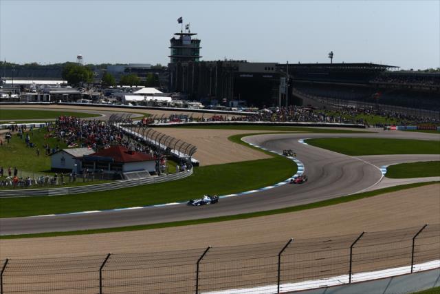 Cars navigate the turns during INDYCAR GP -- Photo by: Bret Kelley