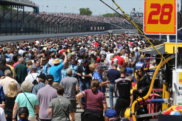 The pre-race grid comes to life along pit lane prior to the start of the INDYCAR Grand Prix at the Indianapolis Motor Speedway -- Photo by: Chris Jones