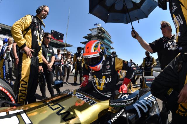 James Hinchcliffe gets into his car before the INDYCAR GP race -- Photo by: Chris Owens