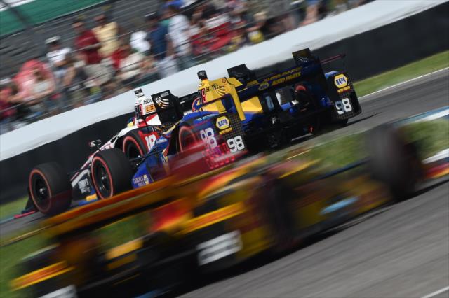 Sebastien Bourdais and Alexander Rossi fly toward Turn 3 during the INDYCAR Grand Prix at the Indianapolis Motor Speedway -- Photo by: Chris Owens