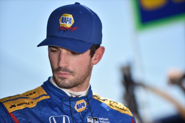 Alexander Rossi waits along pit lane prior to the final warmup for the INDYCAR Grand Prix at the Indianapolis Motor Speedway -- Photo by: Dana Garrett