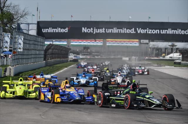 Cars navigate the turns during INDYCAR GP -- Photo by: John Cote
