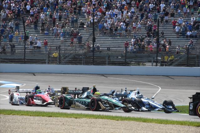 Cars race through the INDYCAR GP course -- Photo by: Jim Haines