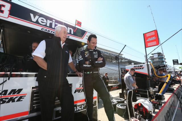 Team owner Roger Penske and Helio Castroneves chat along pit lane prior to the final warmup for the INDYCAR Grand Prix at the Indianapolis Motor Speedway -- Photo by: Joe Skibinski