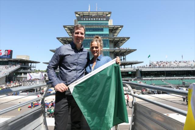 Diary of a Wimpy Kid Alicia Silverstone and author Jeff Kinney hold the green flag before the INDYCAR GP -- Photo by: Joe Skibinski
