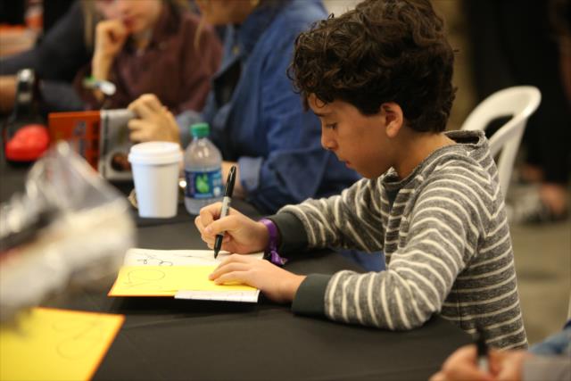 Diary of a Wimpy Kid actor Jason Drucker signs autographs. -- Photo by: Joe Skibinski