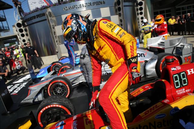 Ryan Hunter-Reay steps out of his No 28 DHL Honda in Victory Circle following his podium finish in the INDYCAR Grand Prix at the Indianapolis Motor Speedway -- Photo by: Matt Fraver