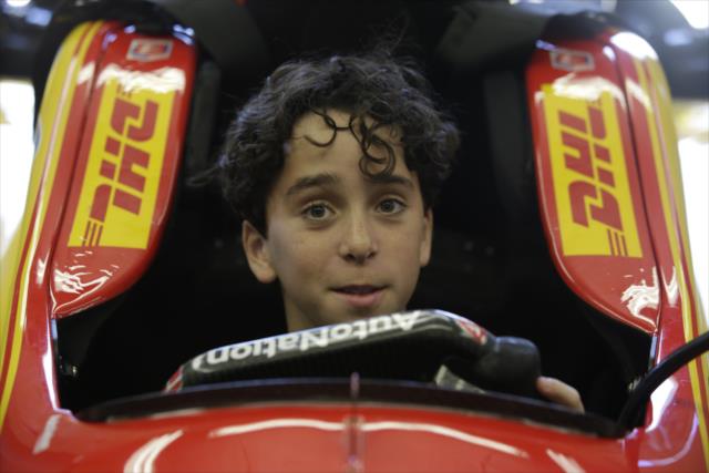 'Diary of a Wimpy Kid' star Jason Drucker sits in Ryan Hunter-Reay's Indy car -- Photo by: Shawn Gritzmacher