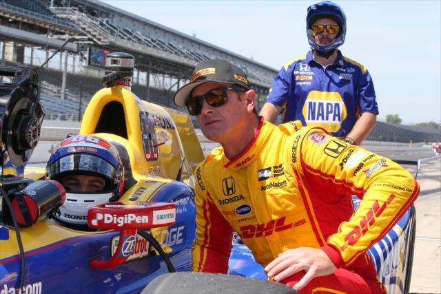 Ryan Hunter-Reay chats with Alexander Rossi along pit lane during practice for the 101st Indianapolis 500 -- Photo by: Chris Jones