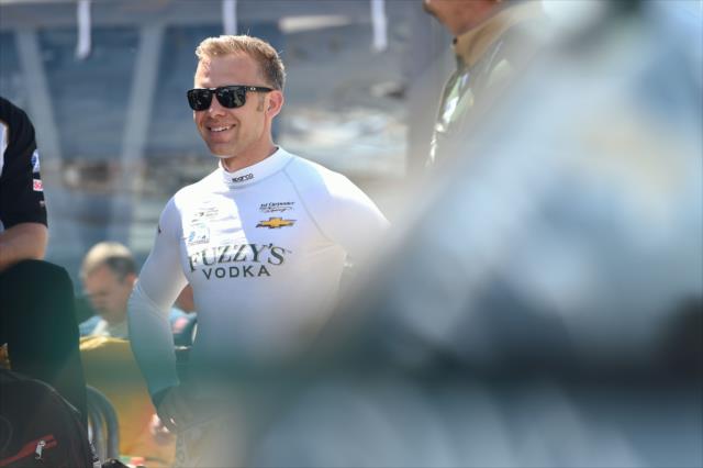 Ed Carpenter chats with his team along pit lane during practice for the 101st Indianapolis 500 -- Photo by: Chris Owens