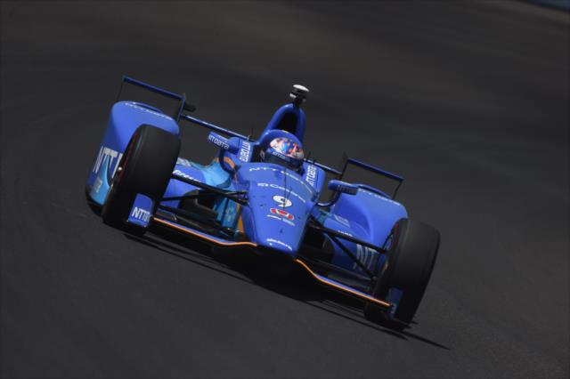 Scott Dixon flies through Turn 1 during practice for the 101st Indianapolis 500 -- Photo by: Chris Owens