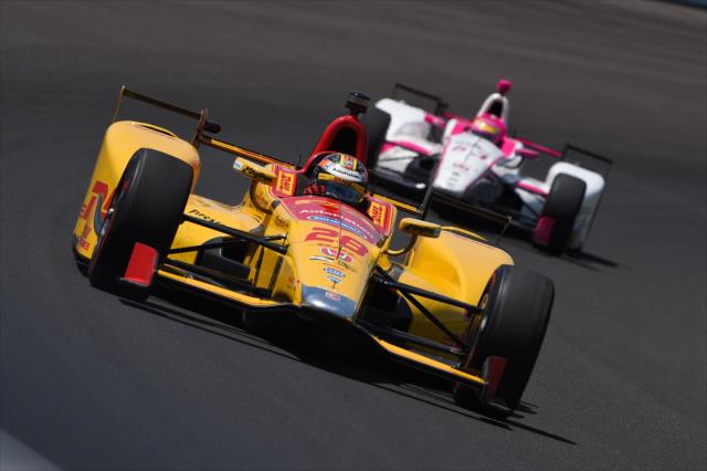Ryan Hunter-Reay and Pippa Mann roll through Turn 3 during practice for the 101st Indianapolis 500 -- Photo by: Chris Owens