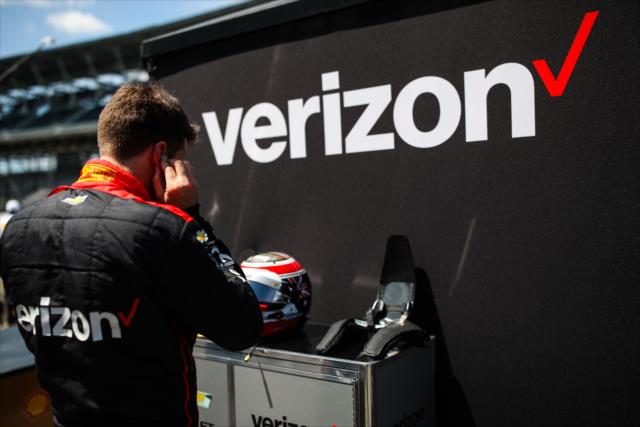 Will Power sets his earpieces along pit lane prior to practice for the 101st Indianapolis 500 -- Photo by: David Yowe