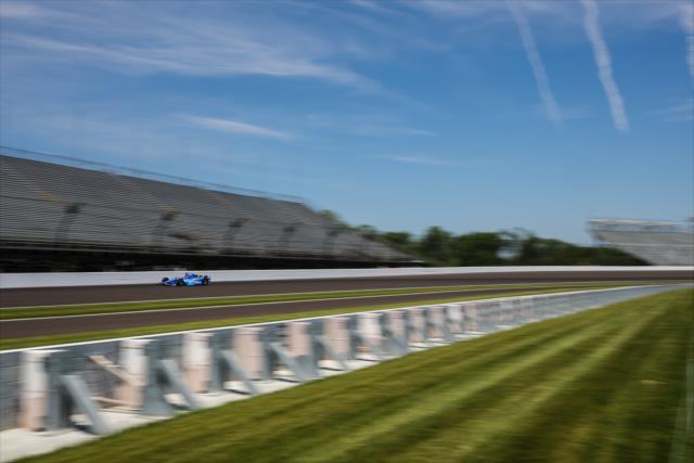Scott Dixon streaks through the North Chute during practice for the 101st Indianapolis 500 -- Photo by: David Yowe