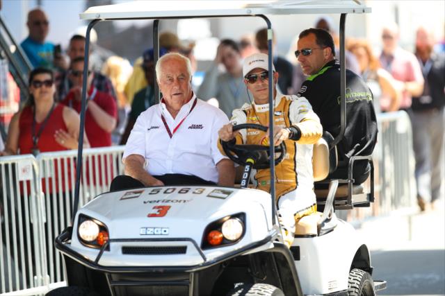 Helio Castroneves and team owner Roger Penske roll out of Gasoline Alley to pit lane prior to practice for the 101st Indianapolis 500 -- Photo by: David Yowe