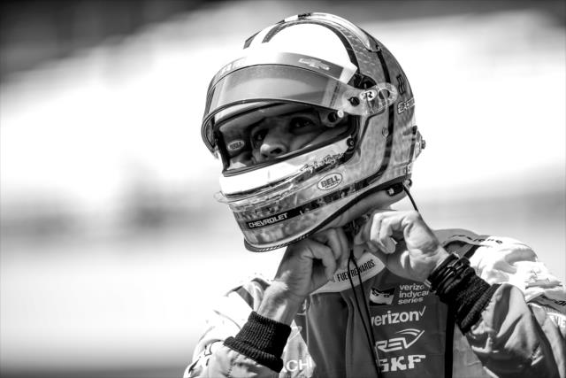 Helio Castroneves secures his helmet on pit lane prior to practice for the 101st Indianapolis 500 -- Photo by: David Yowe