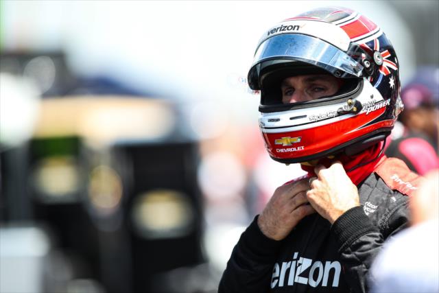 Will Power secures his helmet along pit lane prior to practice for the 101st Indianapolis 500 -- Photo by: David Yowe