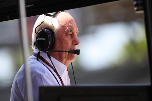 Team owner Roger Penske watches track activity from his pit stand during practice for the 101st Indianapolis 500 -- Photo by: David Yowe