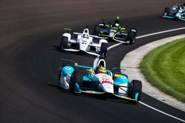 Gabby Chaves leads a group through Turn 3 during practice for the 101st Indianapolis 500 -- Photo by: David Yowe