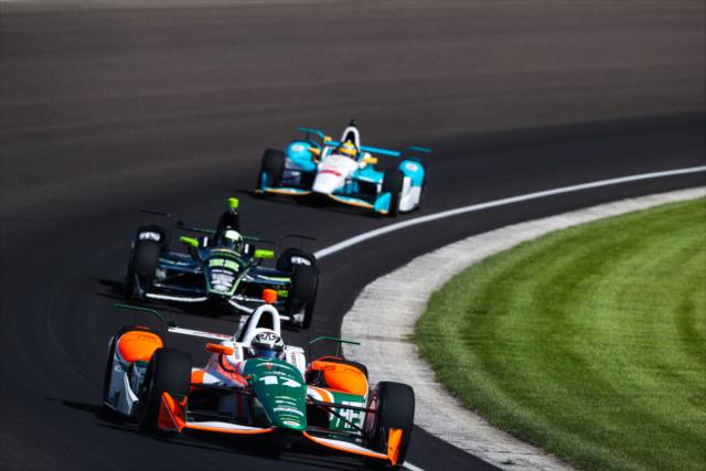 Colombians Sebastian Saavedra leads Juan Pablo Montoya and Gabby Chaves through Turn 3 during practice for the 101st Indianapolis 500 -- Photo by: David Yowe