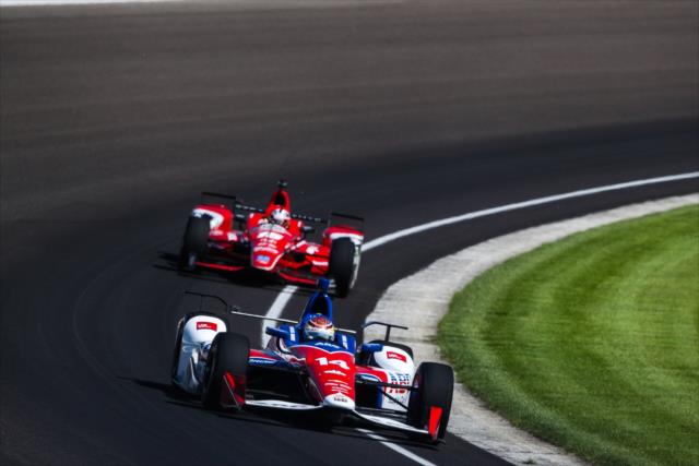 Carlos Munoz and Graham Rahal sail into Turn 3 during practice for the 101st Indianapolis 500 -- Photo by: David Yowe