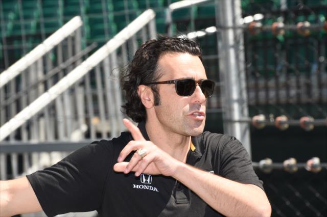 Three-time Indianapolis 500 champion Dario Franchitti walks pit lane prior to practice for the 101st Indianapolis 500 -- Photo by: Jim Haines