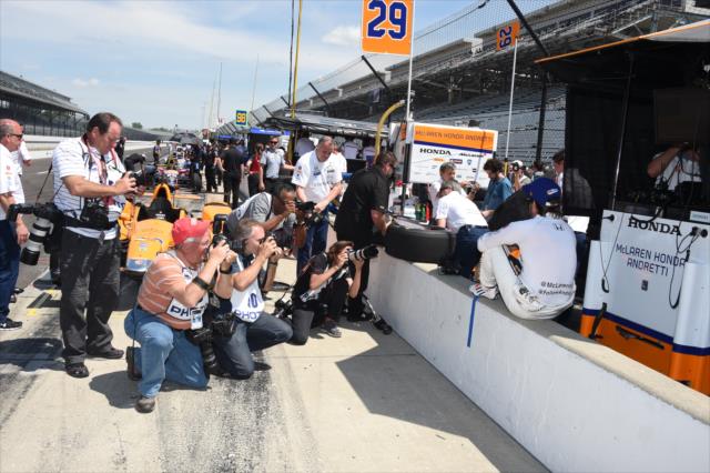 Photographers capture the perfect Fernando Alonso image along pit wall prior to practice for the 101st Indianapolis 500 -- Photo by: Jim Haines