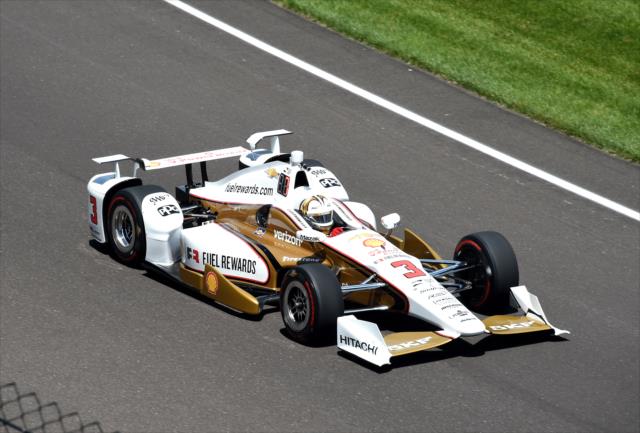Helio Castroneves makes his entrance into Turn 1 during practice for the 101st Indianapolis 500 -- Photo by: Jim Haines