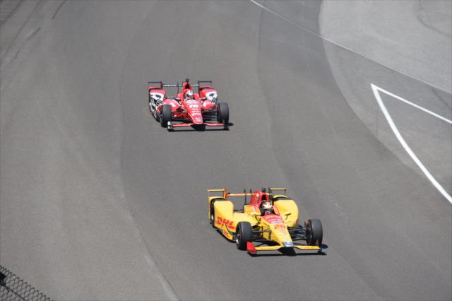 Ryan Hunter-Reay leads Graham Rahal into Turn 1 during practice for the 101st Indianapolis 500 -- Photo by: Jim Haines