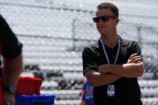 AJ Allmendinger watches track activity from pit lane during practice for the 101st Indianapolis 500 -- Photo by: Joe Skibinski