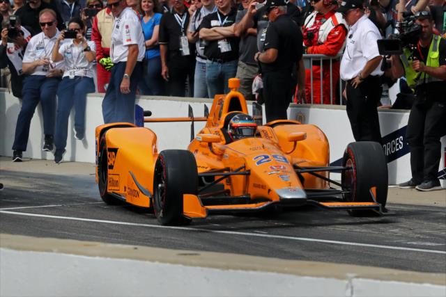 Fernando Alonso exits his pit box -- Photo by: Bret Kelley