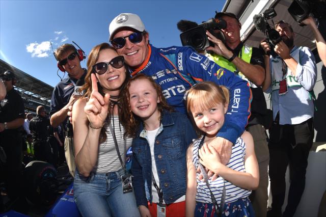 Scott Dixon and his family pose after he won Pole position for the Indianapolis Motor Speedway. -- Photo by: Chris Owens