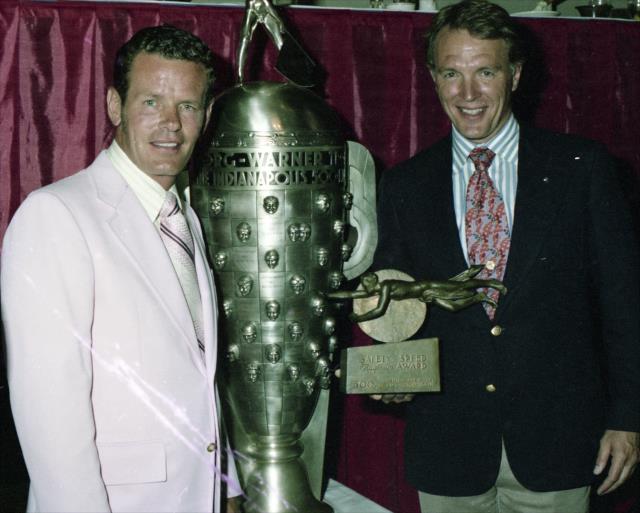 Dan Gurney and Bobby Unser with the Borg-Warner Trophy in 1975 after Unser's Indy 500 victory
