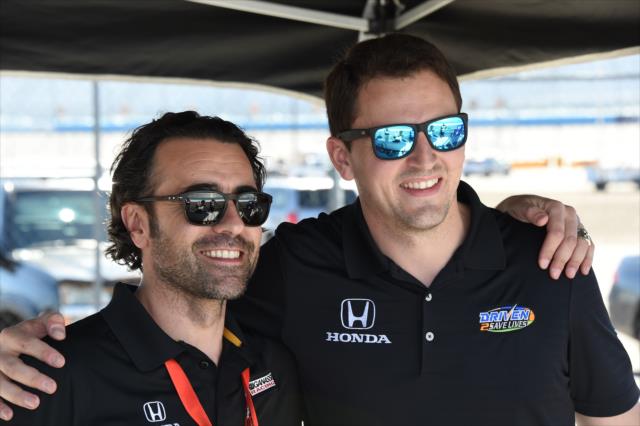 Dario Franchitti and Stefan Wilson in the paddock area at ISM Raceway -- Photo by: John Cote