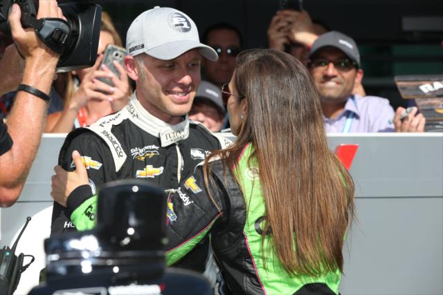 Ed Carpenter is congratulated by teammate Danica Patrick after winning the pole position for the 102nd Indianapolis 500 at the Indianapolis Motor Speedway -- Photo by: Chris Jones