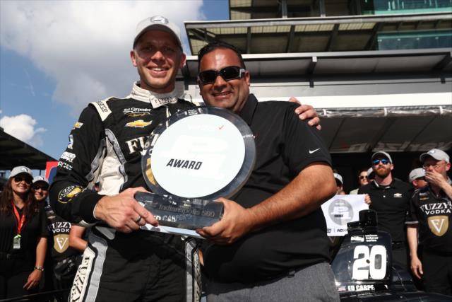 Ed Carpenter is presented the Verizon P1 Award for winning the pole position for the 102nd Indianapolis 500 at the Indianapolis Motor Speedway -- Photo by: Chris Jones