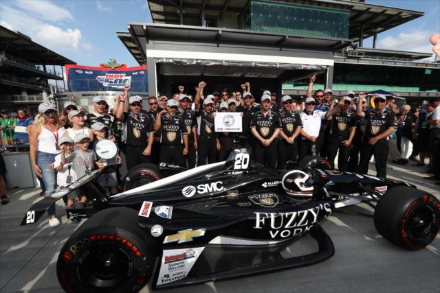 The No. 20 Ed Carpenter Racing Fuzzy's Vodka team poses on pit lane after claiming the pole position for the 102nd Running of the Indianapolis 500 -- Photo by: Chris Jones
