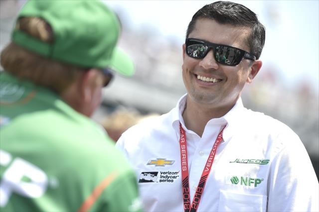 Team owner Ricardo Juncos chats with his team prior to qualifications for the 102nd Indianapolis 500 at the Indianapolis Motor Speedway -- Photo by: Chris Owens