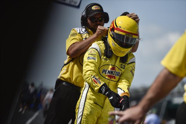 Helio Casroneves gets prepped along pit lane prior to his qualification attempt for the 102nd Indianapolis 500 at the Indianapolis Motor Speedway -- Photo by: Chris Owens