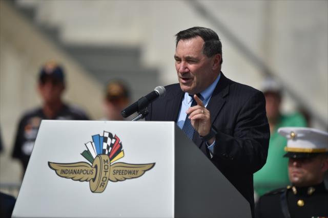 United States Senator Joe Donnelly addresses the crowd during the enlistment ceremony at the Indianapolis Motor Speedway -- Photo by: Dana Garrett