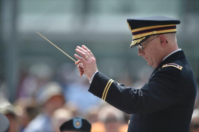 The 38th Infantry Divison Band conductor during the enlistment ceremony during Armed Services Day at the Indianapolis Motor Speedway -- Photo by: Dana Garrett