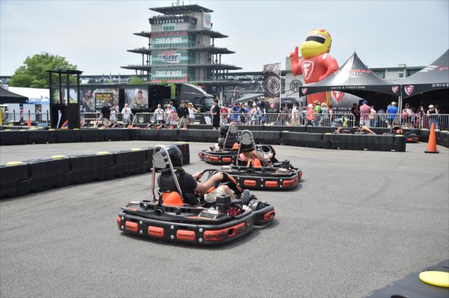 Fans get a taste of the racing action at the infield go-kart track during Crown Royal Qualifying Weekend. -- Photo by: Dana Garrett