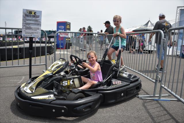 A young fan is ready to hit the karting track in the infield of the Indianapolis Motor Speedway -- Photo by: Dana Garrett