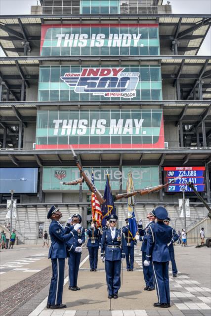 The Colorguard and Drill teams performing during the Armed Forces enlistment ceremony at the Indianapolis Motor Speedway. -- Photo by: Doug Mathews