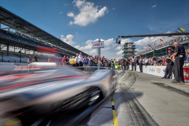 Will Power screams out of pit lane to start his qualification attempt for the 102nd Indianapolis 500 at the Indianapolis Motor Speedway -- Photo by: Doug Mathews