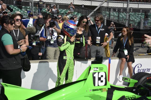 Danica Patrick adjusts her helmet along pit lane prior to her qualification attempt for the 102nd Indianapolis 500 at the Indianapolis Motor Speedway -- Photo by: Jim Haines