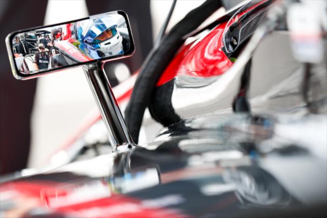 The reflection of Robert Wickens in the No. 6 Lucas Oil Honda on pit lane prior to his qualification attempt for the 102nd Indianapolis 500 at the Indianapolis Motor Speedway -- Photo by: Joe Skibinski