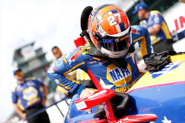 Alexander Rossi slides into his No. 27 NAPA Auto Parts Honda on pit lane prior to his qualification attempt for the 102nd Indianapolis 500 at the Indianapolis Motor Speedway -- Photo by: Joe Skibinski